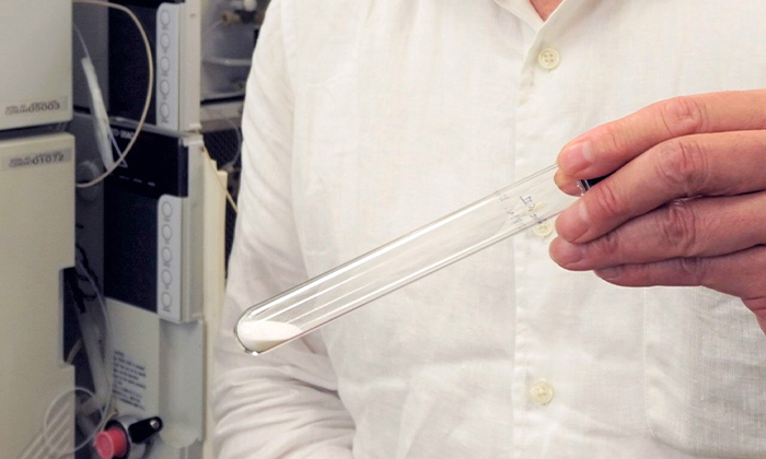 DualPore™ particles in a test tube. How fine they are! This tiny particle holds a variety of possibilities.